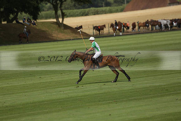 Jaeger Le Coultre (black)  v Wairakei Pastoral (white) in a Jaeger Le Coultre Holden White Cup polo match played on 29 July 2013 at Cowdray Park Polo Club on Brooksfieldwww.polopictures.co.uk