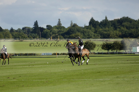 Aryana (black) v Shoreline (yellow) in a Farewell Cup polo match played on Ambersham 5 at Cowdray Park Polo Club on Wednesday 18 September 2013. www.polopictures.co.uk