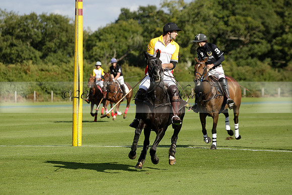Aryana (black) v Shoreline (yellow) in a Farewell Cup polo match played on Ambersham 5 at Cowdray Park Polo Club on Wednesday 18 September 2013. www.polopictures.co.uk