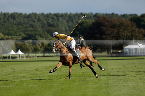 Aryana (black) v Shoreline (yellow) in a Farewell Cup polo match played on Ambersham 5 at Cowdray Park Polo Club on Wednesday 18 September 2013. www.polopictures.co.uk