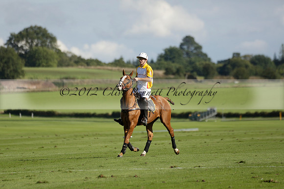 Aryana (black) v Shoreline (yellow) in a Farewell Cup polo match played on Ambersham 5 at Cowdray Park Polo Club on Wednesday 18 September 2013. www.polopictures.co.uk