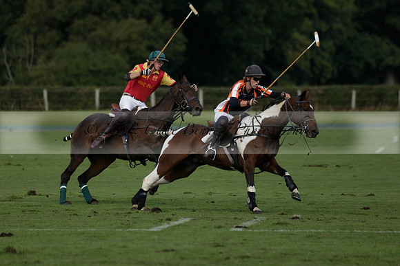 Four Quarters Black (black) v BHC (red) in a Autumn Cup polo match on Ambersham 2 at Cowdray Park Polo Club on Friday 20 September 2013 www.polopictures.co.uk