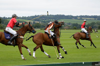 Four Quarters Black (black) v Clashleigh (red) in the Autumn Cup subsidiary final polo match on Ambersham 2 at Cowdray Park Polo Club on Sunday 22 September 2013 www.polopictures.co.uk
