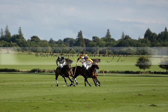 Aryana (black) v Shoreline (yellow) in a Farewell Cup polo match played on Ambersham 5 at Cowdray Park Polo Club on Wednesday 18 September 2013. www.polopictures.co.uk