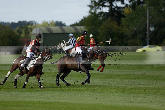 Four Quarters Black (black) v BHC (red) in a Autumn Cup polo match on Ambersham 2 at Cowdray Park Polo Club on Friday 20 September 2013 www.polopictures.co.uk