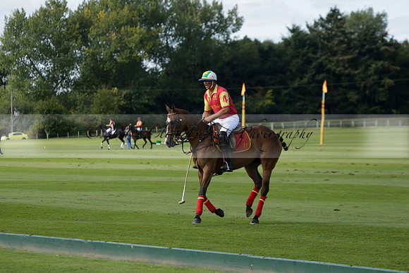 Four Quarters Black (black) v BHC (red) in a Autumn Cup polo match on Ambersham 2 at Cowdray Park Polo Club on Friday 20 September 2013 www.polopictures.co.uk