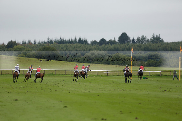 Four Quarters Black (black) v Clashleigh (red) in the Autumn Cup subsidiary final polo match on Ambersham 2 at Cowdray Park Polo Club on Sunday 22 September 2013 www.polopictures.co.uk
