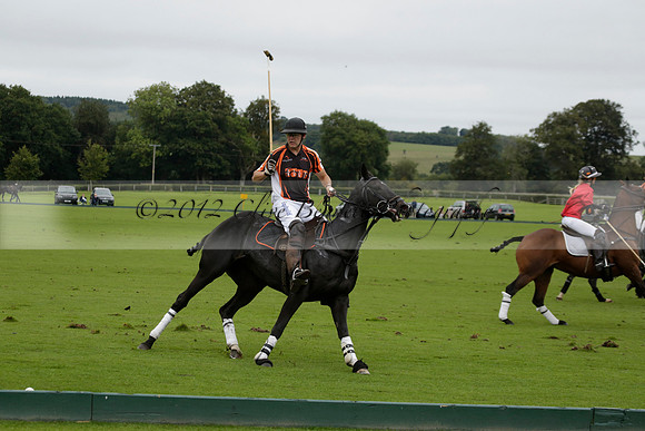 Four Quarters Black (black) v Clashleigh (red) in the Autumn Cup subsidiary final polo match on Ambersham 2 at Cowdray Park Polo Club on Sunday 22 September 2013 www.polopictures.co.uk