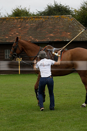 Four Quarters Black (black) v Clashleigh (red) in the Autumn Cup subsidiary final polo match on Ambersham 2 at Cowdray Park Polo Club on Sunday 22 September 2013 www.polopictures.co.uk