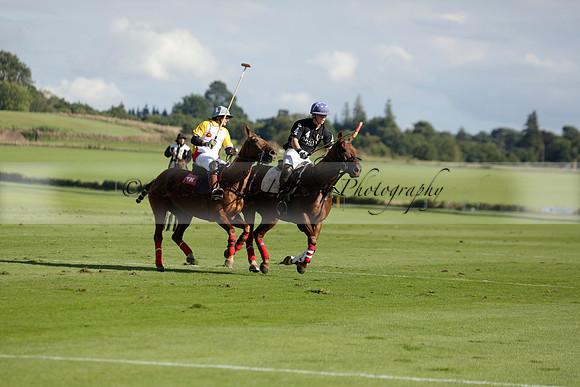 Aryana (black) v Shoreline (yellow) in a Farewell Cup polo match played on Ambersham 5 at Cowdray Park Polo Club on Wednesday 18 September 2013. www.polopictures.co.uk