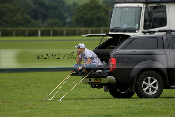 Four Quarters Black (black) v Clashleigh (red) in the Autumn Cup subsidiary final polo match on Ambersham 2 at Cowdray Park Polo Club on Sunday 22 September 2013 www.polopictures.co.uk