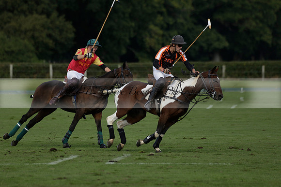Four Quarters Black (black) v BHC (red) in a Autumn Cup polo match on Ambersham 2 at Cowdray Park Polo Club on Friday 20 September 2013 www.polopictures.co.uk
