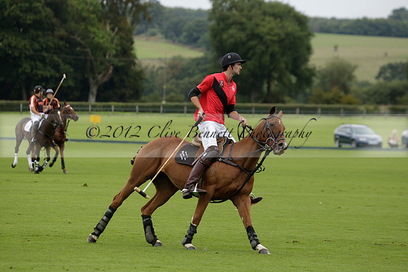 Four Quarters Black (black) v Clashleigh (red) in the Autumn Cup subsidiary final polo match on Ambersham 2 at Cowdray Park Polo Club on Sunday 22 September 2013 www.polopictures.co.uk