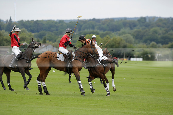 Four Quarters Black (black) v Clashleigh (red) in the Autumn Cup subsidiary final polo match on Ambersham 2 at Cowdray Park Polo Club on Sunday 22 September 2013 www.polopictures.co.uk