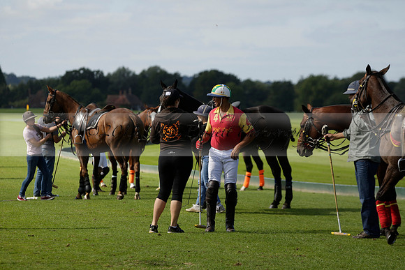 Four Quarters Black (black) v BHC (red) in a Autumn Cup polo match on Ambersham 2 at Cowdray Park Polo Club on Friday 20 September 2013 www.polopictures.co.uk