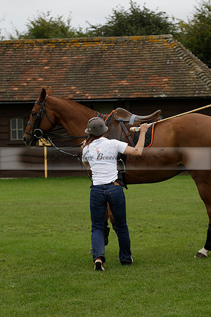 Four Quarters Black (black) v Clashleigh (red) in the Autumn Cup subsidiary final polo match on Ambersham 2 at Cowdray Park Polo Club on Sunday 22 September 2013 www.polopictures.co.uk