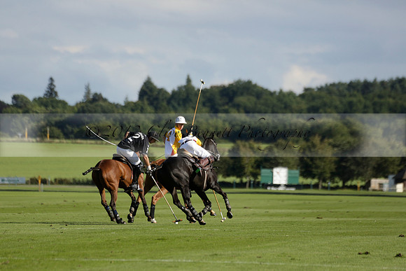 Aryana (black) v Shoreline (yellow) in a Farewell Cup polo match played on Ambersham 5 at Cowdray Park Polo Club on Wednesday 18 September 2013. www.polopictures.co.uk
