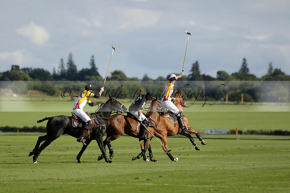 Aryana (black) v Shoreline (yellow) in a Farewell Cup polo match played on Ambersham 5 at Cowdray Park Polo Club on Wednesday 18 September 2013. www.polopictures.co.uk