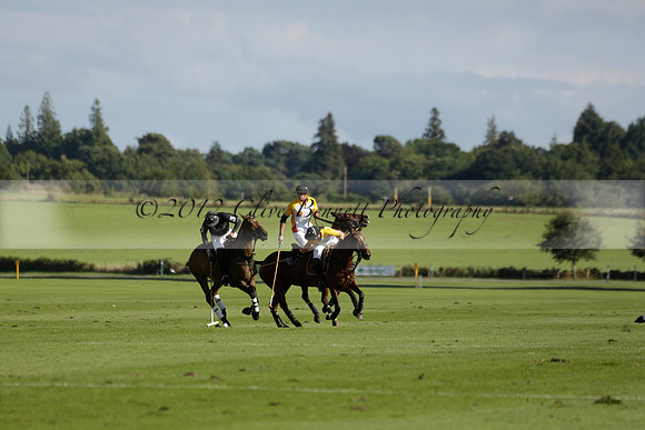 Aryana (black) v Shoreline (yellow) in a Farewell Cup polo match played on Ambersham 5 at Cowdray Park Polo Club on Wednesday 18 September 2013. www.polopictures.co.uk