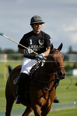Aryana (black) v Shoreline (yellow) in a Farewell Cup polo match played on Ambersham 5 at Cowdray Park Polo Club on Wednesday 18 September 2013. www.polopictures.co.uk