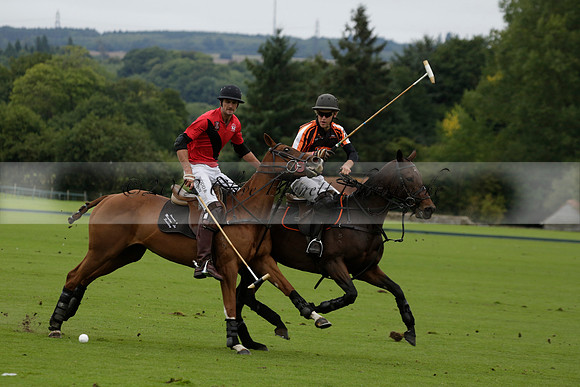Four Quarters Black (black) v Clashleigh (red) in the Autumn Cup subsidiary final polo match on Ambersham 2 at Cowdray Park Polo Club on Sunday 22 September 2013 www.polopictures.co.uk