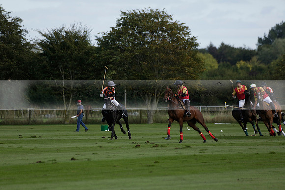 Four Quarters Black (black) v BHC (red) in a Autumn Cup polo match on Ambersham 2 at Cowdray Park Polo Club on Friday 20 September 2013 www.polopictures.co.uk