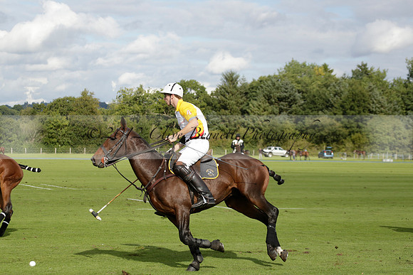 Aryana (black) v Shoreline (yellow) in a Farewell Cup polo match played on Ambersham 5 at Cowdray Park Polo Club on Wednesday 18 September 2013. www.polopictures.co.uk