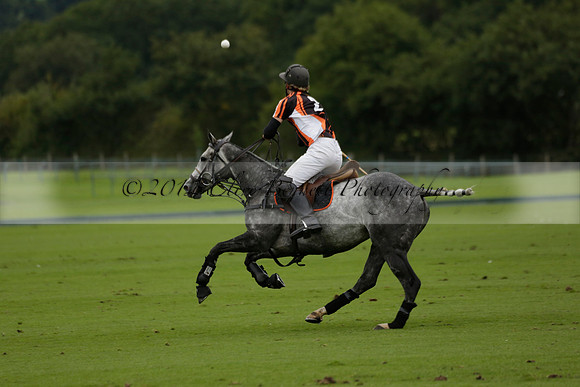 Four Quarters Black (black) v Clashleigh (red) in the Autumn Cup subsidiary final polo match on Ambersham 2 at Cowdray Park Polo Club on Sunday 22 September 2013 www.polopictures.co.uk