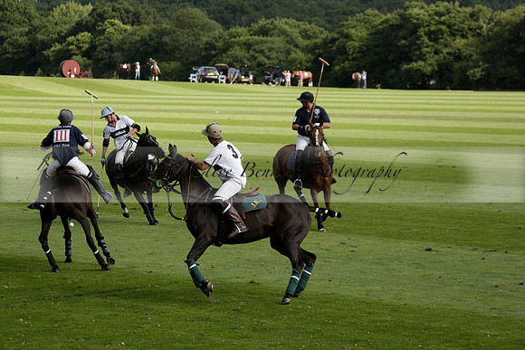 Pandas (white) v Home Farm (navy) in a Park House West Sussex Cup Polo match on Brooksfield at Cowdray Park Polo Club on Friday 30 August 2013. 2013.08.30 www.polopictures.co.uk