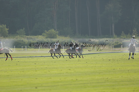 Pluma Negra (white) v Shoreline (black) in the Brecknock Cup Subsidiary final polo match played on Sunday 25 August 2013 at Cowdray Park Polo Club on Ambersham 1. 2013.10.12 www.polopictures.co.uk