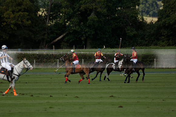 Four Quarters Black (black) v BHC (red) in a Autumn Cup polo match on Ambersham 2 at Cowdray Park Polo Club on Friday 20 September 2013 www.polopictures.co.uk
