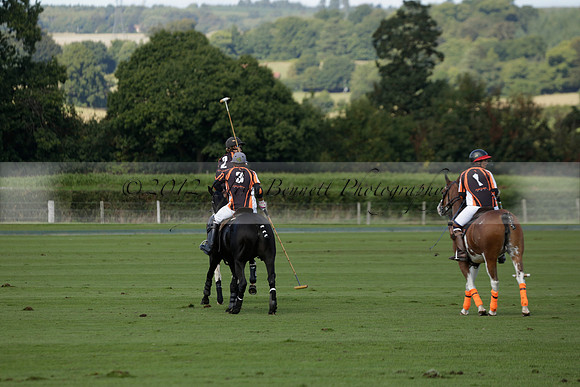 Four Quarters Black (black) v BHC (red) in a Autumn Cup polo match on Ambersham 2 at Cowdray Park Polo Club on Friday 20 September 2013 www.polopictures.co.uk