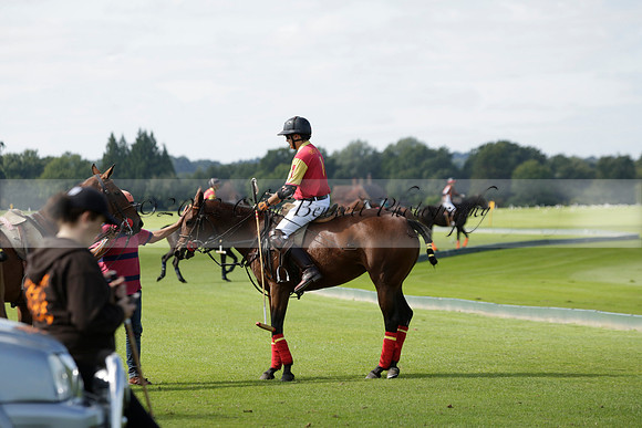 Four Quarters Black (black) v BHC (red) in a Autumn Cup polo match on Ambersham 2 at Cowdray Park Polo Club on Friday 20 September 2013 www.polopictures.co.uk