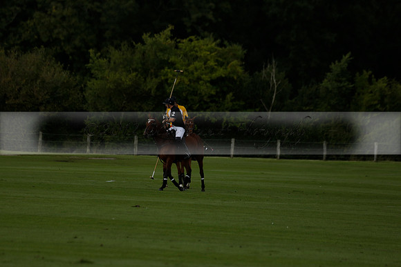Aryana (black) v Shoreline (yellow) in a Farewell Cup polo match played on Ambersham 5 at Cowdray Park Polo Club on Wednesday 18 September 2013. www.polopictures.co.uk