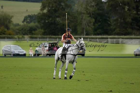 Four Quarters Black (black) v Clashleigh (red) in the Autumn Cup subsidiary final polo match on Ambersham 2 at Cowdray Park Polo Club on Sunday 22 September 2013 www.polopictures.co.uk