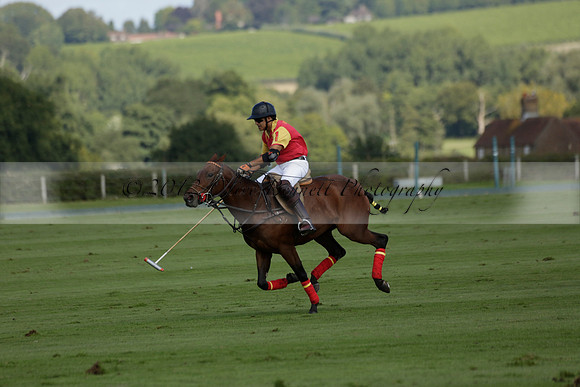 Four Quarters Black (black) v BHC (red) in a Autumn Cup polo match on Ambersham 2 at Cowdray Park Polo Club on Friday 20 September 2013 www.polopictures.co.uk