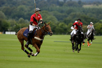 Four Quarters Black (black) v Clashleigh (red) in the Autumn Cup subsidiary final polo match on Ambersham 2 at Cowdray Park Polo Club on Sunday 22 September 2013 www.polopictures.co.uk