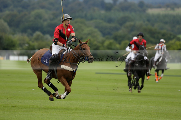 Four Quarters Black (black) v Clashleigh (red) in the Autumn Cup subsidiary final polo match on Ambersham 2 at Cowdray Park Polo Club on Sunday 22 September 2013 www.polopictures.co.uk