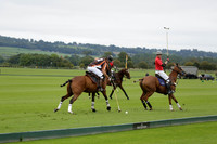 Four Quarters Black (black) v Clashleigh (red) in the Autumn Cup subsidiary final polo match on Ambersham 2 at Cowdray Park Polo Club on Sunday 22 September 2013 www.polopictures.co.uk