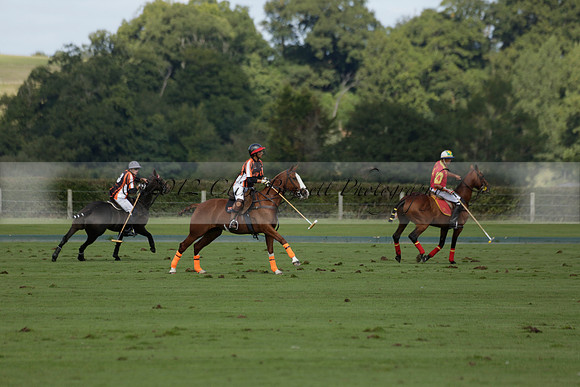 Four Quarters Black (black) v BHC (red) in a Autumn Cup polo match on Ambersham 2 at Cowdray Park Polo Club on Friday 20 September 2013 www.polopictures.co.uk