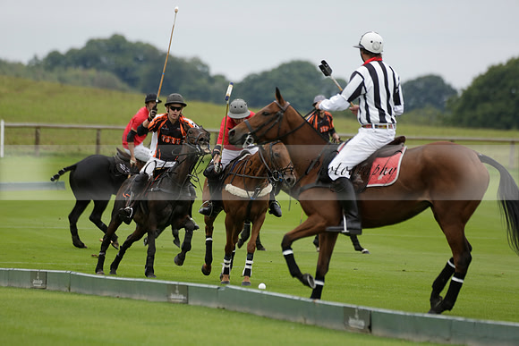 Four Quarters Black (black) v Clashleigh (red) in the Autumn Cup subsidiary final polo match on Ambersham 2 at Cowdray Park Polo Club on Sunday 22 September 2013 www.polopictures.co.uk