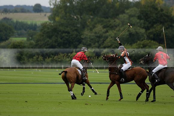 Four Quarters Black (black) v Clashleigh (red) in the Autumn Cup subsidiary final polo match on Ambersham 2 at Cowdray Park Polo Club on Sunday 22 September 2013 www.polopictures.co.uk