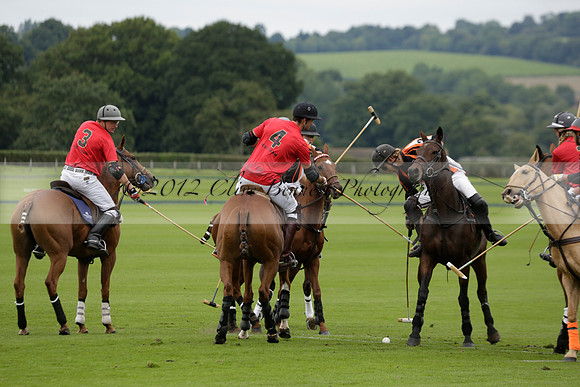 Four Quarters Black (black) v Clashleigh (red) in the Autumn Cup subsidiary final polo match on Ambersham 2 at Cowdray Park Polo Club on Sunday 22 September 2013 www.polopictures.co.uk