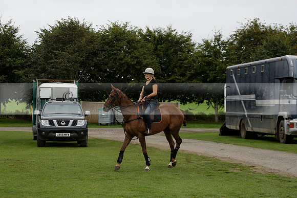 Four Quarters Black (black) v Clashleigh (red) in the Autumn Cup subsidiary final polo match on Ambersham 2 at Cowdray Park Polo Club on Sunday 22 September 2013 www.polopictures.co.uk