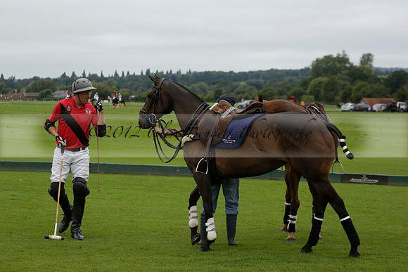 Four Quarters Black (black) v Clashleigh (red) in the Autumn Cup subsidiary final polo match on Ambersham 2 at Cowdray Park Polo Club on Sunday 22 September 2013 www.polopictures.co.uk