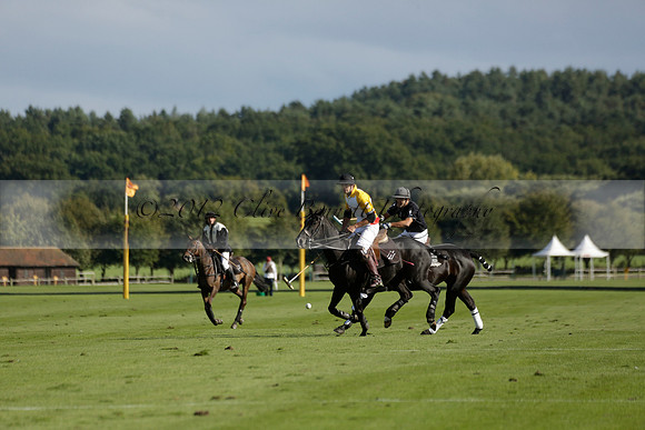 Aryana (black) v Shoreline (yellow) in a Farewell Cup polo match played on Ambersham 5 at Cowdray Park Polo Club on Wednesday 18 September 2013. www.polopictures.co.uk
