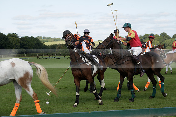 Four Quarters Black (black) v BHC (red) in a Autumn Cup polo match on Ambersham 2 at Cowdray Park Polo Club on Friday 20 September 2013 www.polopictures.co.uk
