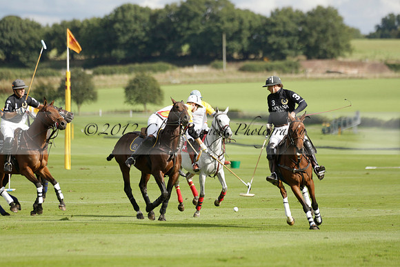 Aryana (black) v Shoreline (yellow) in a Farewell Cup polo match played on Ambersham 5 at Cowdray Park Polo Club on Wednesday 18 September 2013. www.polopictures.co.uk