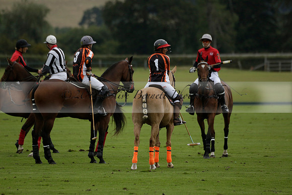 Four Quarters Black (black) v Clashleigh (red)in a Jaeger Le Coultre Autumn Cup polo match played on Ambersham 2 at Cowdray Park Polo Club on Wednesday 2013.09.11 www.polopictures.co.uk