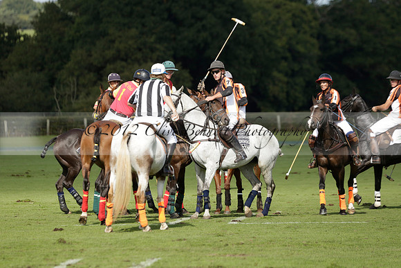 Four Quarters Black (black) v BHC (red) in a Autumn Cup polo match on Ambersham 2 at Cowdray Park Polo Club on Friday 20 September 2013 www.polopictures.co.uk